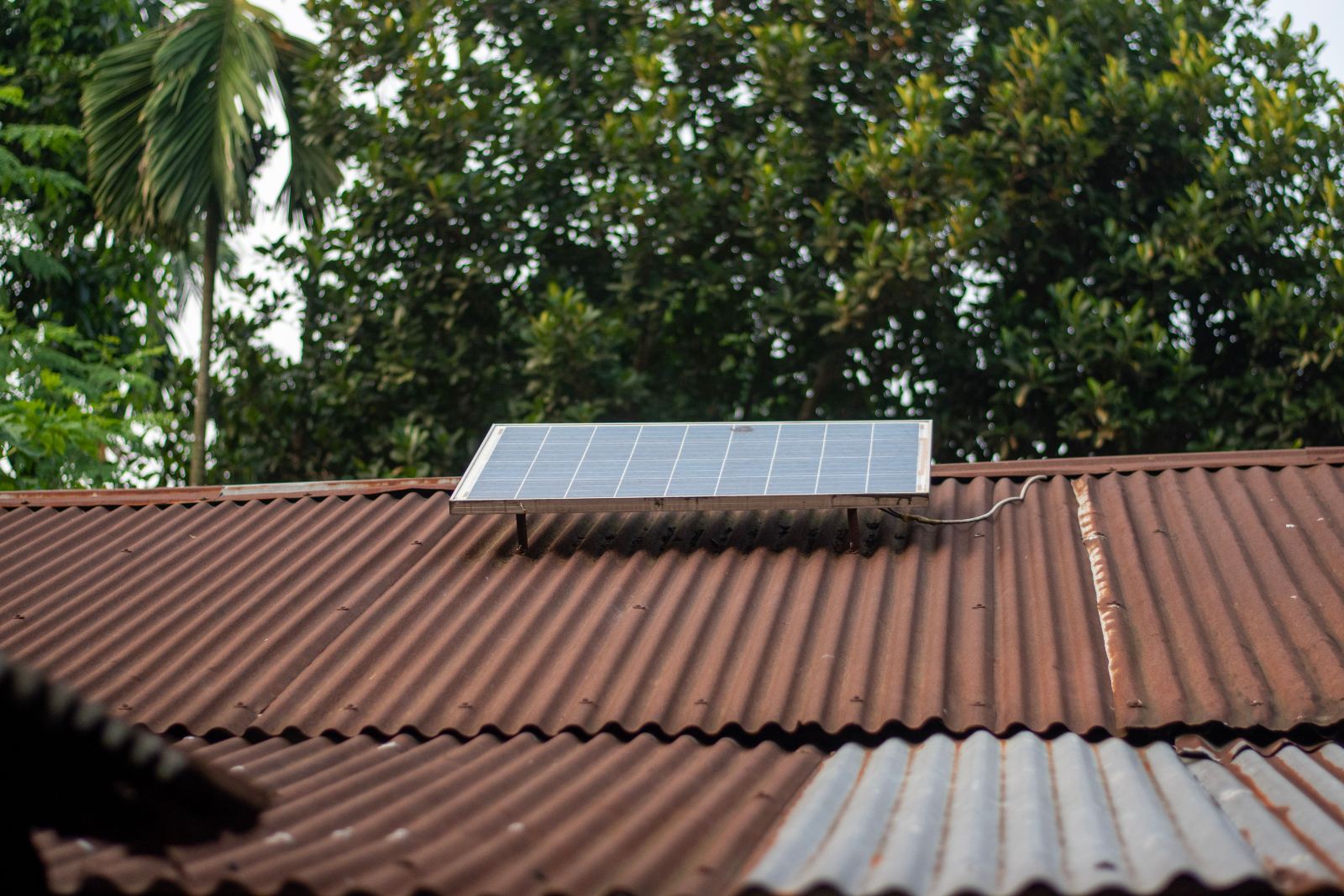 Solar panel installation on a corrugated roof